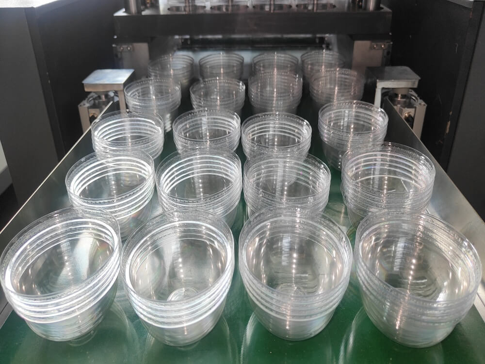 plastic thermoforming machine stacked finished products