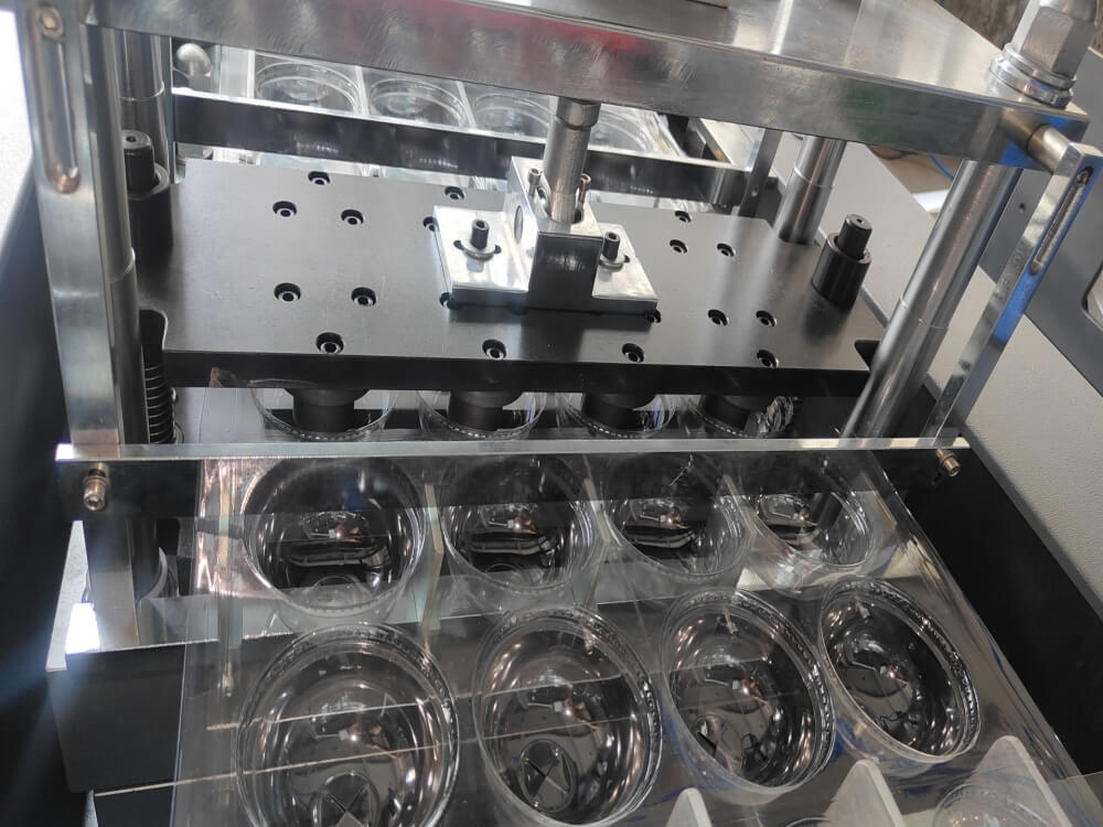 thermoforming machine hole punching