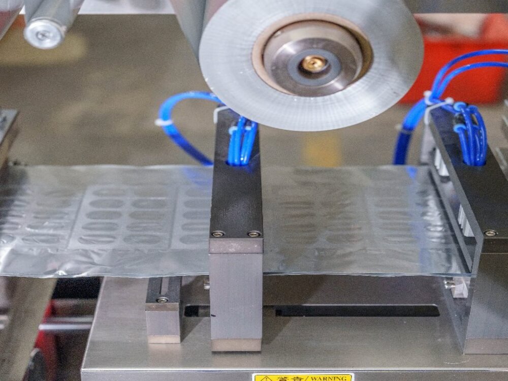 tablet blister packing machine heat sealing station